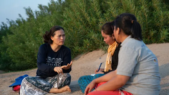 Left to right Koeut Chhunly, Theum Chan Thou, and Sor Navy share in a session led by Koeut Chhunly, Senior Program Coordinator of PBO during a river patrol