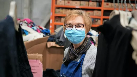 Irene Klassen sorts clothing at Thrift on Kent in Kitchener. The thousands of Thrift volunteers in Ontario have been steadfast in their support of MCC through the closures and limited reopenings throu