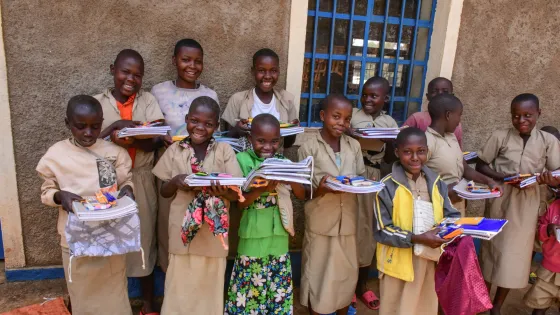 Batwa school children express their joy after receiving MCC school kits. MCC's partner Help Channel Burundi (HCB) held the distribution at Borera primary school, Kayogoro, Makamba Province, Burundi, i