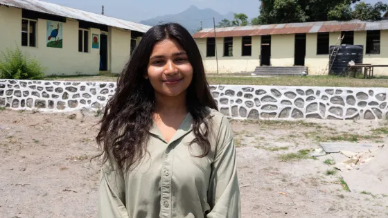 Mamata Parajuli (22) is at Shree Sabitri Secondary School, where the school installed electrical wire after participating in the awareness meeting organized by Mamata and her team to talk about the ri