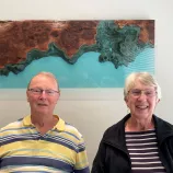 A man and woman smiling for a photo