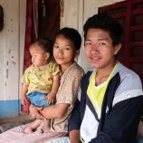 Ishwor Man Magar (20), a farmer with his wife Hima Magar (21) and son Funcha Magar (15 months) in Kerabari Rural Municipality-3, Morang, Nepal on Saturday, April 20, 2024.